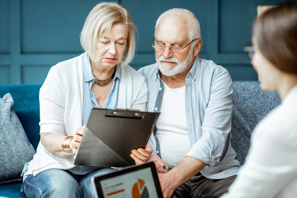 Senior couple meeting with consultant